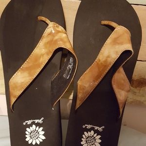 Yellow box flip flops